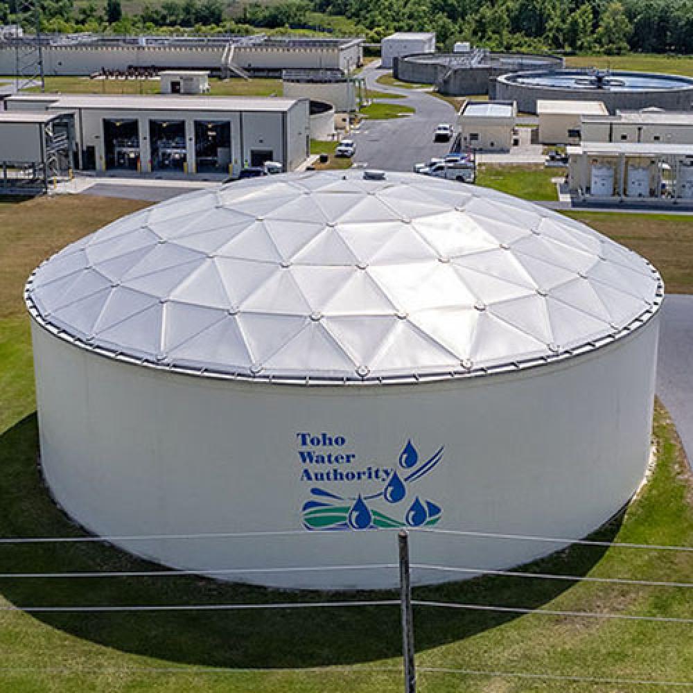 Image of storage tank with Toho logo.