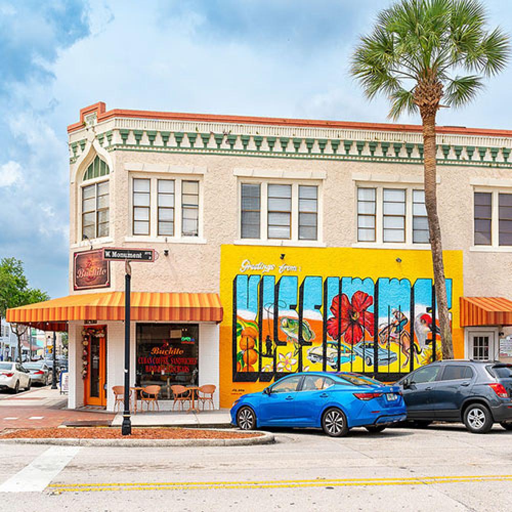 Image of building in downtown Kissimmee with mural. 