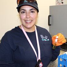 Image Wastewater Treatment Operator B Angela Perez conducting a test on a wastewater sample. 